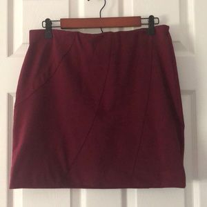 Maroon skirt.
